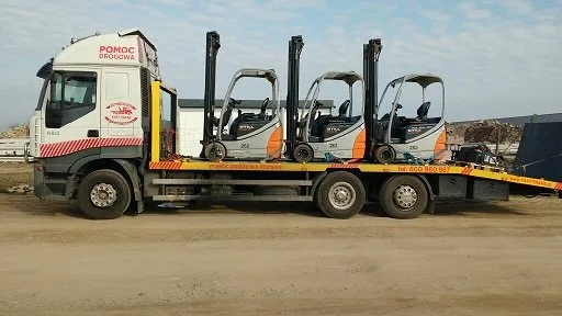 Transport Wózków Widłowych Maszyn Koparek Poznań